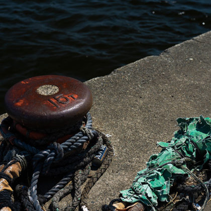 The harbor of Enoshima with old bollards and ropework